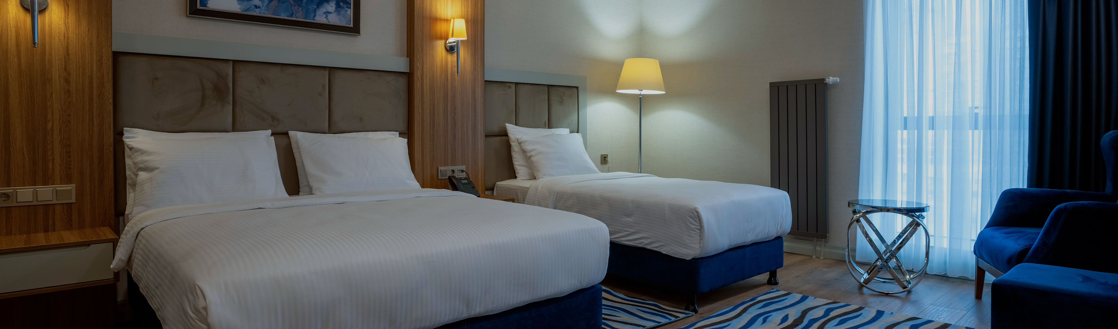 SUPERIOR ROOM WITH 1 QUEEN + 1 SINGLE