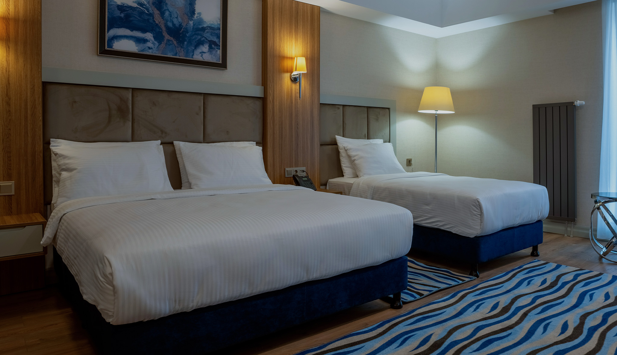 SUPERIOR ROOM WITH 1 QUEEN + 1 SINGLE