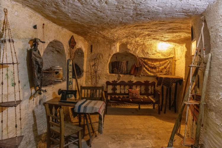 A cave with items stored in it